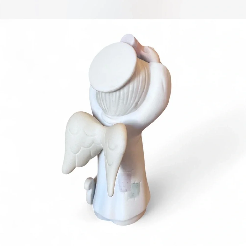 Precious Moments ‘The Heavenly Light’ Figurine in good condition